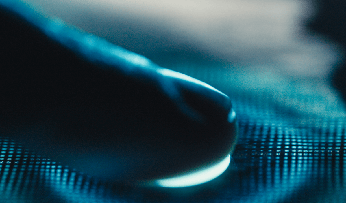 A closeup look of a digital fingerprint in neon blue color